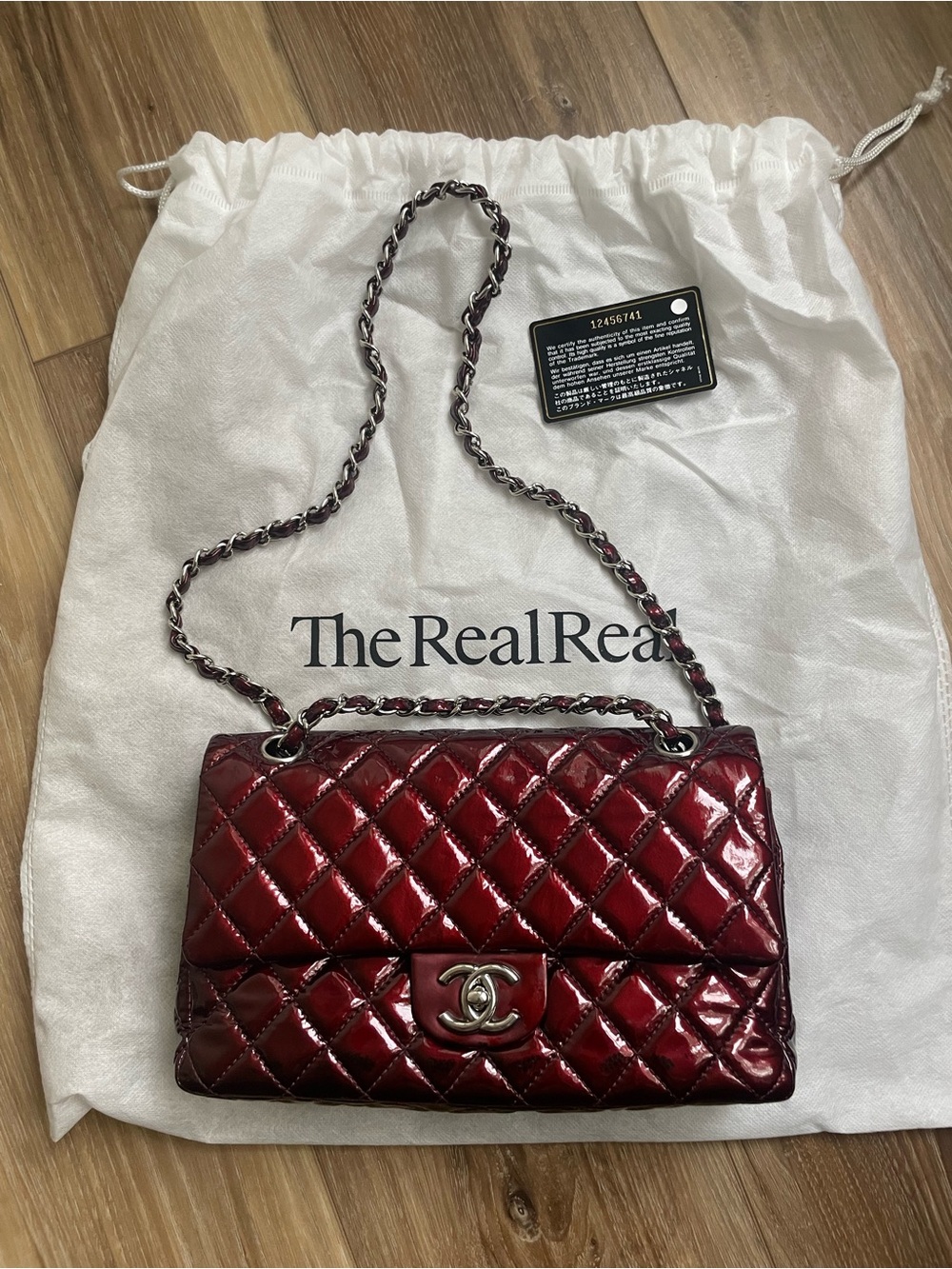 CHANEL Quilted Patent Leather Shoulder Bag in Burgundy